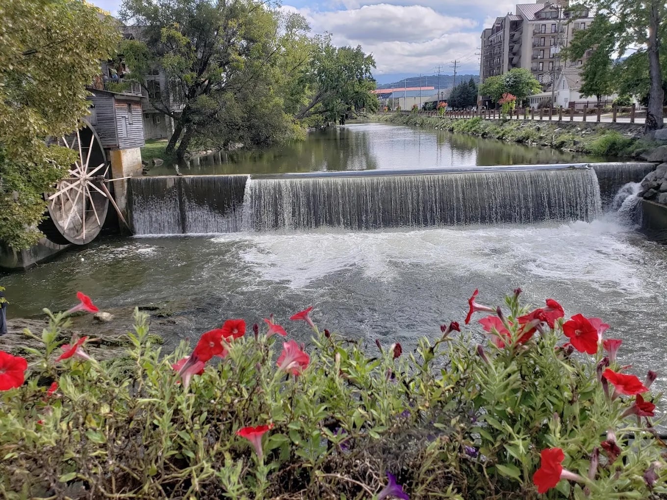 The Old Mill waterwheel and dam on the Little Pigeon River in Pigeon Forge, Tennessee